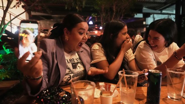 From tequila cocktails to themed pop-ups, Taylor Swift fans celebrate 'The Life of a Showgirl'