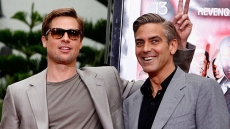 Brad Pitt, George Clooney 'Competitive' With Each Other
