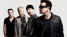 U2 offers new album free on iTunes
