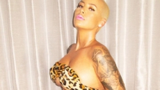 Amber Rose poses topless
