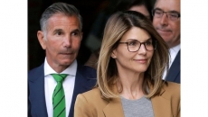 Loughlin, Giannulli remain silent as they await prison fate