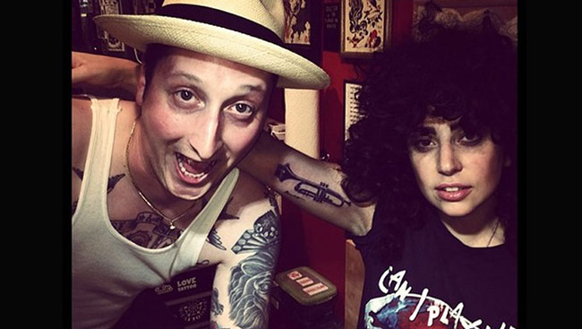 Lady Gaga gets trumpet tattoo on arm