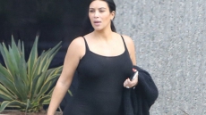 Kim Kardashian Flaunts Baby Bump While Exercising
