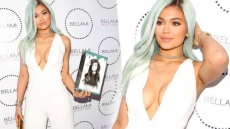 Kylie Jenner Flaunts Ample Cleavage While Partying