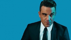 Bored Robbie Williams plans to quit music