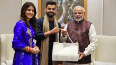 PIC: Virat Kohli, Anushka Sharma Invite PM Narendra Modi To Their Wedding Party