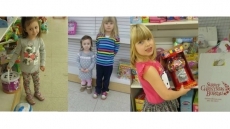 Help Ryley and Chloe stock the shelves at the Surrey Christmas Bureau