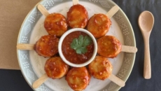 Chicken lollies in a sweet chilly sauce