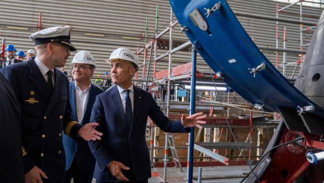 Canada won't split its submarine contract between suppliers: Carney