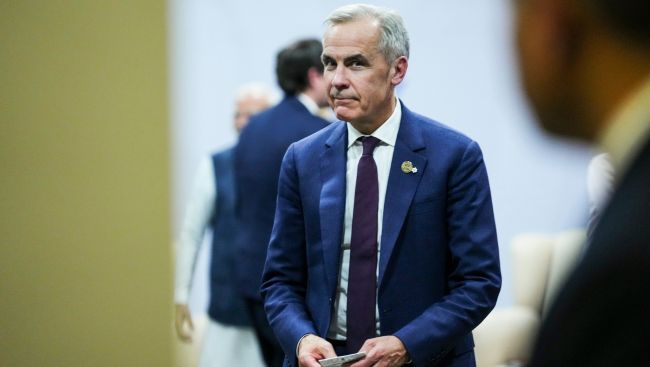 Carney says his comment about speaking with Trump was a 'poor choice of words'