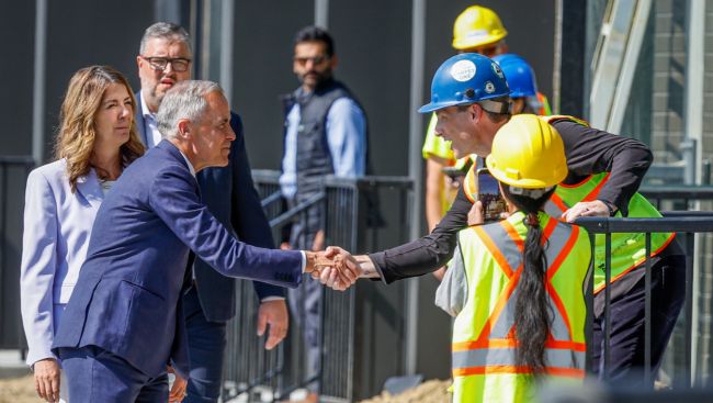 Carney comes to Alberta, talks housing, rides a sprayer, hears from separatists