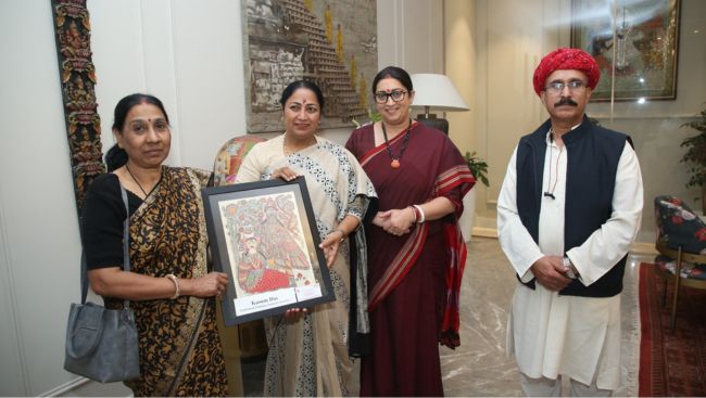 Delhi CM meets Union Minister Smriti Irani at her residence