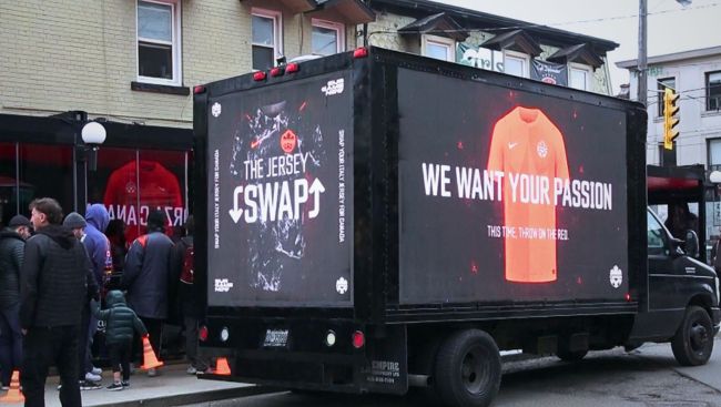 In Toronto’s Little Italy, fans line up to swap jerseys and embrace Team Canada