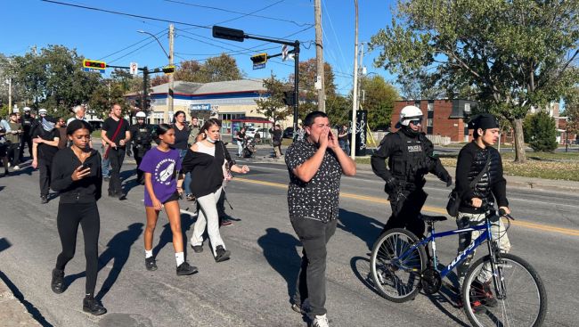 Protesters demand body cameras after fatal shooting of 15-year-old Nooran Rezayi