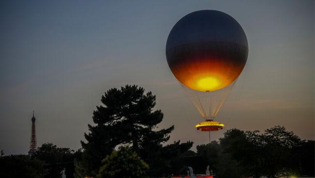 Paris' iconic cauldron from the Olympic Games returns to light up summer nights