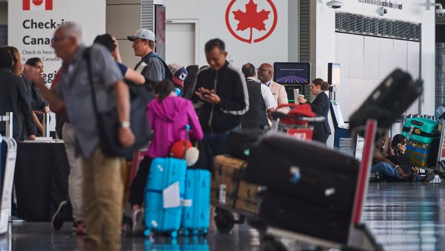 Passengers continue to face travel woes amid Air Canada flight attendants' strike