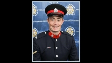 Two accused in 'senseless' death of Calgary cop at traffic stop turn themselves in