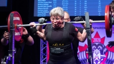 A 68-year-old powerlifter smashes records and says she lives for 'clang' of weights