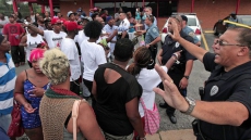 Angry crowd chants 'kill the police' after officer fatally shoots teen in Missouri