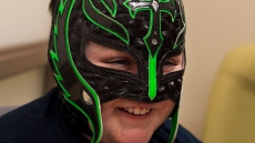Mask Painted In Wrestler's Colours Boosts Spirits Of Boy Going Through Radiation