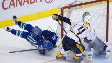 James Neal scores winner late to lift Predators over Canucks 2-1