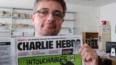 Muslim Woman Editor Arrested For Reprinting 'Charlie Hebdo' Cartoons