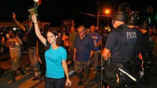 US town where teenager was shot is calm