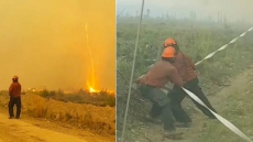 WATCH: B.C. Firefighter Captures Video Of Fire Tornado Sucking Up Hose