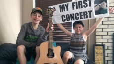 'They've Got Friends In High Places:' Garth Brooks Gives His Guitar To Kids