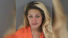 A Driver Passed Out From A Suspected Drug Overdose And A Child Tries To Wake Him