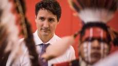 Prime Minister Justin Trudeau Spends A Day On Troubled Reserve, Hauls Water