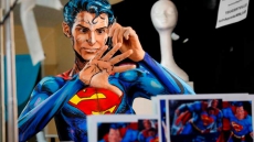 'It's Magic:' Calgary Artist Kay Pike Uses Paint To Transform Into Man Of Steel