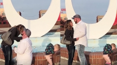 WATCH: Son Steals The Show By Going Rogue In Background Of Mom's Proposal Video