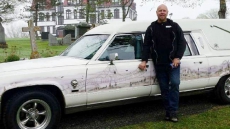 Nova Scotia Car Collector Asked To Remove Graveyard-Painted Hearse From Driveway
