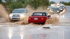 Flooding forces dramatic rescues in Phoenix area after heavy rains pummel state, close roads