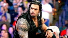 Victoria Fan Taken Into Police Custody For Hitting WWE Wrestler Roman Reigns With Briefcase