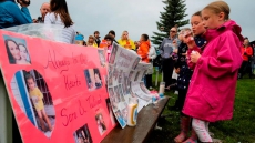 'For You, Baby Girl:' Bubbles And Sparklers At Vigil For Slain Calgary Woman, Daughter