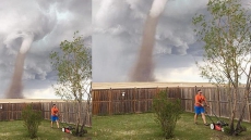 Alberta's Lawnmower Man: Canadian Man Cuts Lawn As Tornado Looms – And Photo Goes Viral