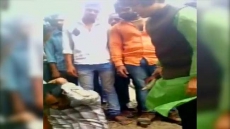 Indian Activist Trupti Desai Thrashes Rape Accused On Camera To 'Teach Him A Lesson'