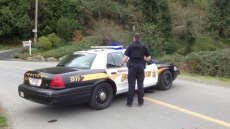 Pair Accused Of Running Abbotsford Roadblock, Stealing Vehicles Face 17 Charges
