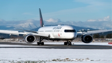 Air Canada lays off 1700 employees and reduces flight capacity by 25 percent