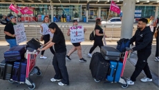 Low on clothes, insulin and options, travellers' woes continue amid Air Canada strike