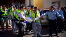 Palestinian attackers storm Jerusalem synagogue, killing 4; 1 Canadian wounded