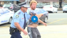 Video: Australian Cop Stops Press Conference To Make An Arrest