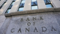 Bank of Canada holds key interest rate steady at 2.25% in soft economy