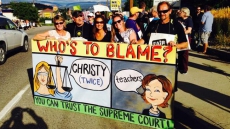 B.C. Premier urges teachers' union suspend strike, union vows indefinite unrest