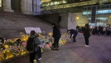 B.C. community holds vigil to mourn deaths, losses in deadly Hong Kong fire