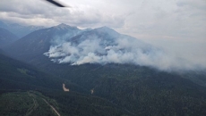 Crews face tree danger from high winds as B.C. wildfires abate due to precipitation