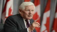 Beijing blasts Rae over 'genocide' allegations