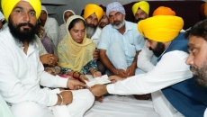 Punjab CM hands over cheque for Rs 1 crore to martyr's family